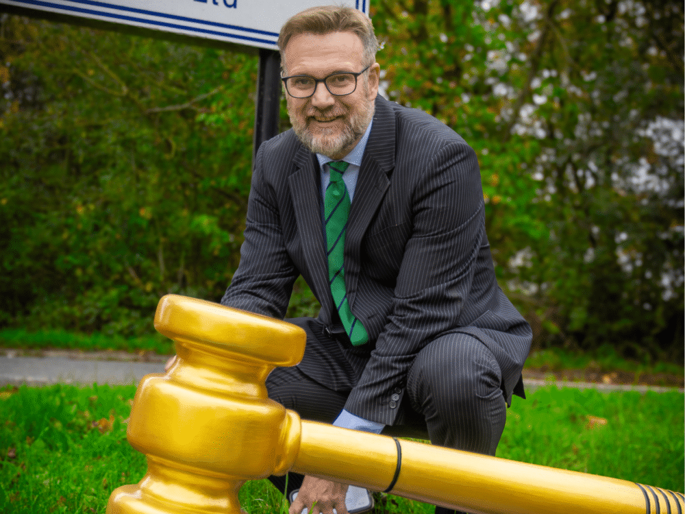 Charles Hanson – the man with the golden gavel – raising money for a good cause